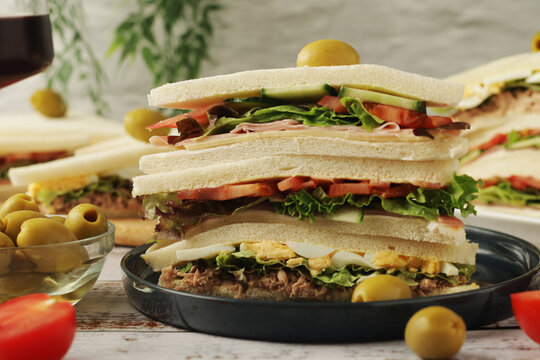 Different Italian tramezzini sandwich in tradition triangle form