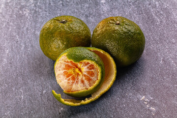Ripe green organic orange citrus