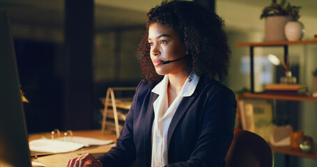 Woman, headset and computer at night, call center or typing with contact at insurance company. Person, broker or consultant with voip mic, pc and overtime with perspective at risk management agency