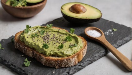 Avocado toast with vibrant green spread, garnished with fresh herbs and seeds