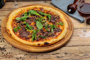 pizza on a wooden table