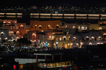 Doha, Qatar - December 10, 2025: Night view of Old Doha port redevelopment into Mina district Box Park Qatar