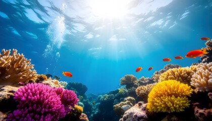 Fototapeta premium Vibrant Coral Reef teeming with colorful fish and sunlight filtering through the ocean surface.