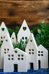 Cluster of White Ceramic Houses in Festive Greenery