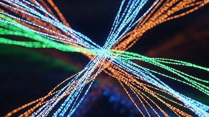 Abstract visualization of intertwined glowing light streams in orange, green, and blue on a dark background