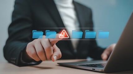 Man pointing at a digital file icon with an alert symbol, indicating a warning or error in data management.