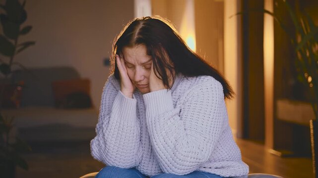 sad senior woman suffers from migraines severe headache, hands massages temples. elderly lonely old age lady feels bad mental health depression emotion. misfortune panic attack problems, lack of money