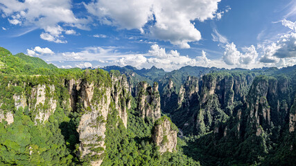 Beautiful quartzite sandstone pillars and mountain peaks of Zhangjiajie National Forest Park in China.