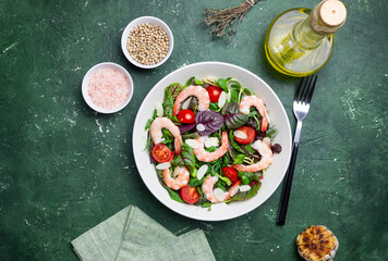 Salad with shrimp, cherry tomato, and almond. Healthy eating. Diet.