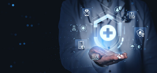Plakat Futuristic healthcare technology concept with male doctor holding digital medical icons in hand on dark background, symbolizing AI-driven online consult system.