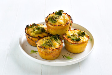 Healthy loaded egg muffins made with eggs, bacon, broccoli, cheese