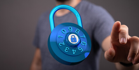 Concept of cybersecurity or data protection represented by hand interacting with a digital blue padlock. Protec