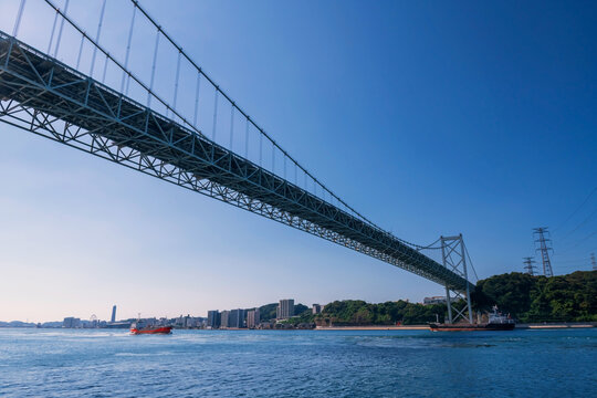 cargo ships pass through Kanmon Bridge, Kitakyushu, Fukuoka