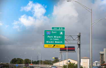 Port of Miami and Miami Beach exit sign on the highway