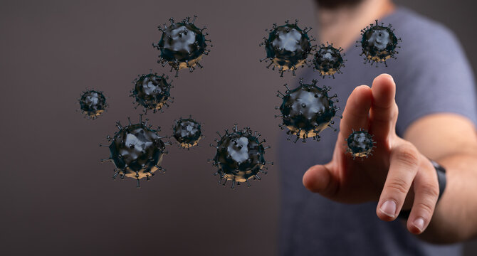Conceptual image of a person interacting with Coronavirus cells, representing control, healthcare and the figh