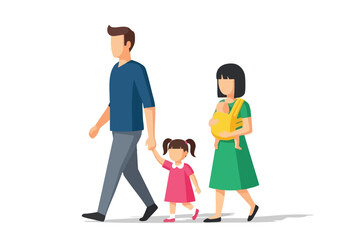 A family walks together, dad holding girl’s hand, mom with baby carrier