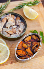 Canister of canned mussels