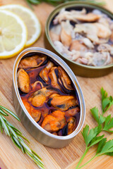 Canister of canned mussels