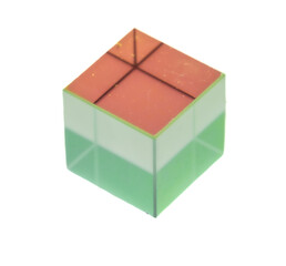 a transparent, three-dimensional cube with a rainbow gradient. The cube has a glass-like texture with subtle reflections and refractions, giving it a semi-reflective appearance