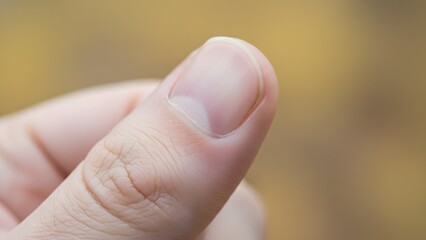 Close-up of Human Finger with Natural Background.