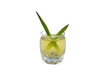 Pandan leaf tea in glass on white background. Herbal drink 