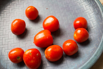 Fresh Roma tomatoes gathered in a container, ripe and natural, isolated on clean background, organic vegetable for cooking and healthy lifestyle.
December 13 2025
Pinrang, South Sulawesi Indonesia.