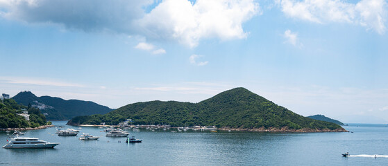Hong Kong Southern District Signature - Enchanting Deep Water Bay Panorama: Yachts Amid Lush Hills in Hong Kong's Luxe Southern Escape  © CYHPhoto