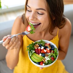 Smiling Woman Enjoying a Healthy Fruit and Vegetable Salad