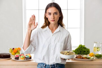 Woman Holding Healthy Bowl Rejecting Unhealthy Dessert Options