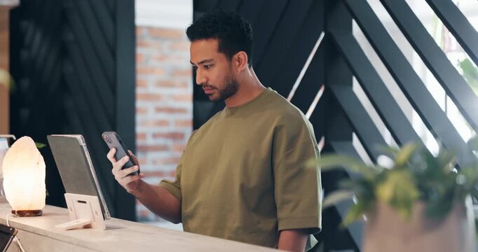 Man, customer and scan with phone at hotel for Qr code, check in and digital payment. Male person, mobile and tablet at reception for online booking, easy transaction and accommodation reservation