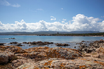 Rocks and water on the beach of San Silverio, Sardinia, Italy.