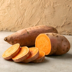 Close up of Vibrant Orange Sweet Potatoes on Display on transparent background