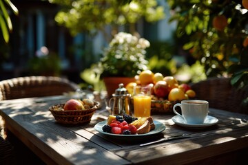 Outdoor breakfast setup with fruit coffee and natural light