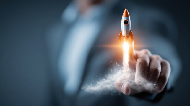 Business person launches a rocket with a finger, representing innovation and progress in a corporate environment