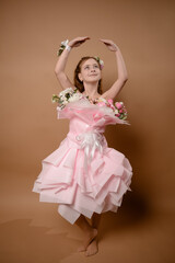 Fototapeta premium photo session of a girl in a bouquet of fresh flowers