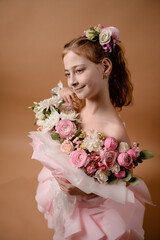 photo session of a girl in a bouquet of fresh flowers