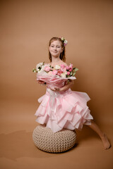 photo session of a girl in a bouquet of fresh flowers