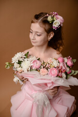 photo session of a girl in a bouquet of fresh flowers