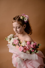 photo session of a girl in a bouquet of fresh flowers