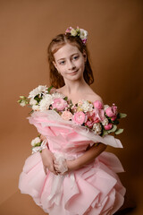 photo session of a girl in a bouquet of fresh flowers