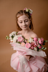 photo session of a girl in a bouquet of fresh flowers