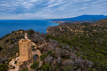 Obraz premium Aerial view of the Aguiló tower, Villajoyosa, Alicante province, Valencian Community, Spain