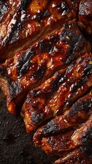 ジューシーで香ばしいバーベキューリブのアップ。料理レシピや食事シーンの素材に最適な肉料理の写真。