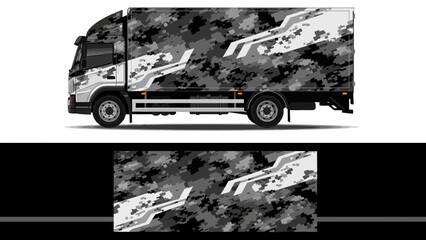 Monochrome mountain graphic van with rugged adventure design on a camper truck.