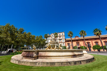 Seville, Spain - August 01, 2024: Hispalis Fountain on Puerta de Jerez Square in Seville, Spain. 