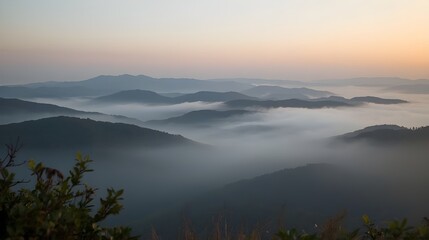 Fototapeta premium Misty mountain landscape with layered hills