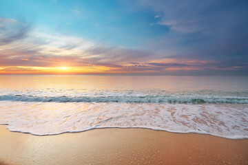 Sandy seashore at sunset.