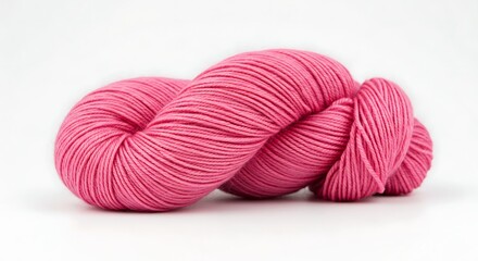 Vibrant Pink Yarn Skein on White Background.