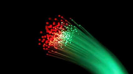A close up shot of glowing fiber optic cables with vibrant red and green lights against a dark background for technology and communication themes