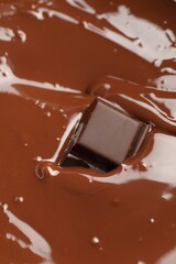 Tasty melted chocolate and piece as background, closeup